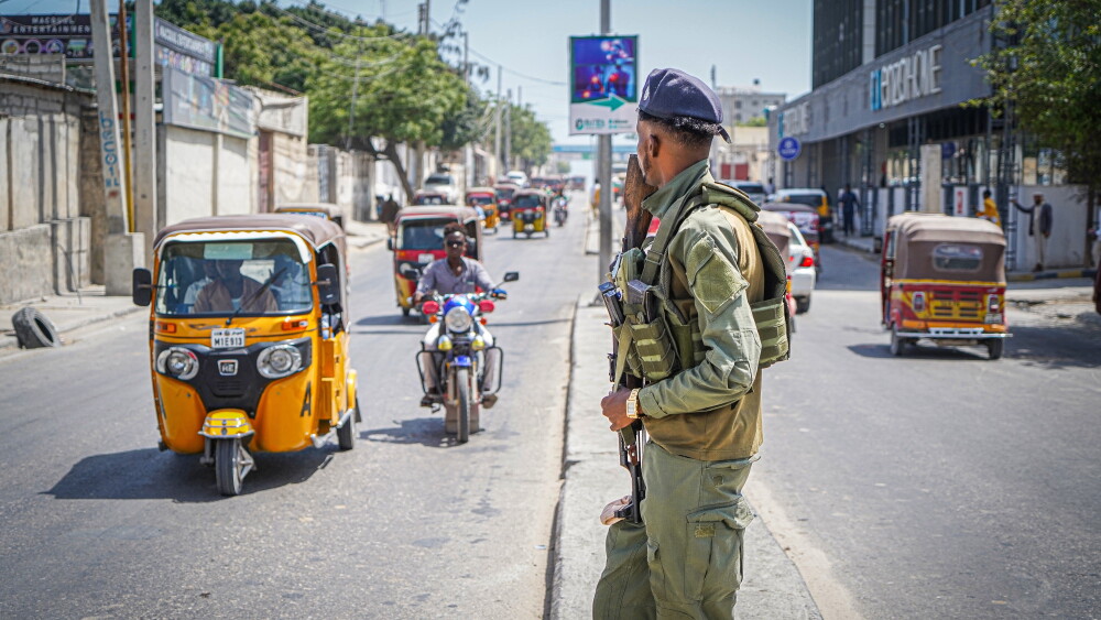 A Somali police officer oversees traffic in Mogadishu, Somalia.