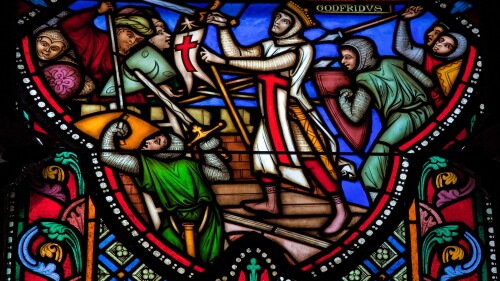 A stained glass window depicting the First Crusade with Godfrey of Bouillon; the Cathedral of St. Michael and St. Gudula, Brussels, Belgium.