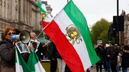 The former flag of Iran is showing up at anti-regime protests, like this one in London in 2024.