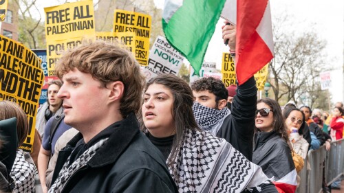Anti-Israel protesters at Columbia University take part in a "March for Divestment" on April 19, 2024.
