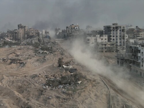 Focused on internal power struggles and oblivious to the outside world's twin obsessions, Jerusalem barely noted the widely-publicized scenes of humiliation and hunger in Gaza that so soured foreign opinions. An Israeli tank driving in the al-Shati refugee camp, North Gaza; March 20, 2024.