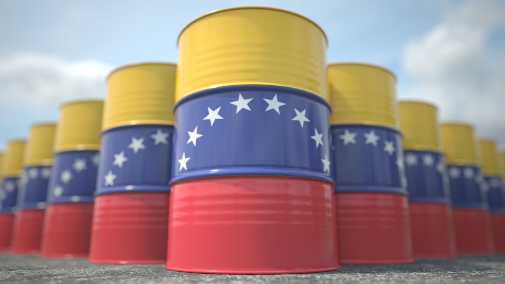 Oil drums are marked with the flag of Venezuela.