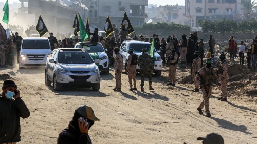 Hamas terrorists hand over Israeli hostages to the Red Cross as part of the ceasefire agreement with Israel; Khan Yunis, southern Gaza Strip, January 30, 2025.