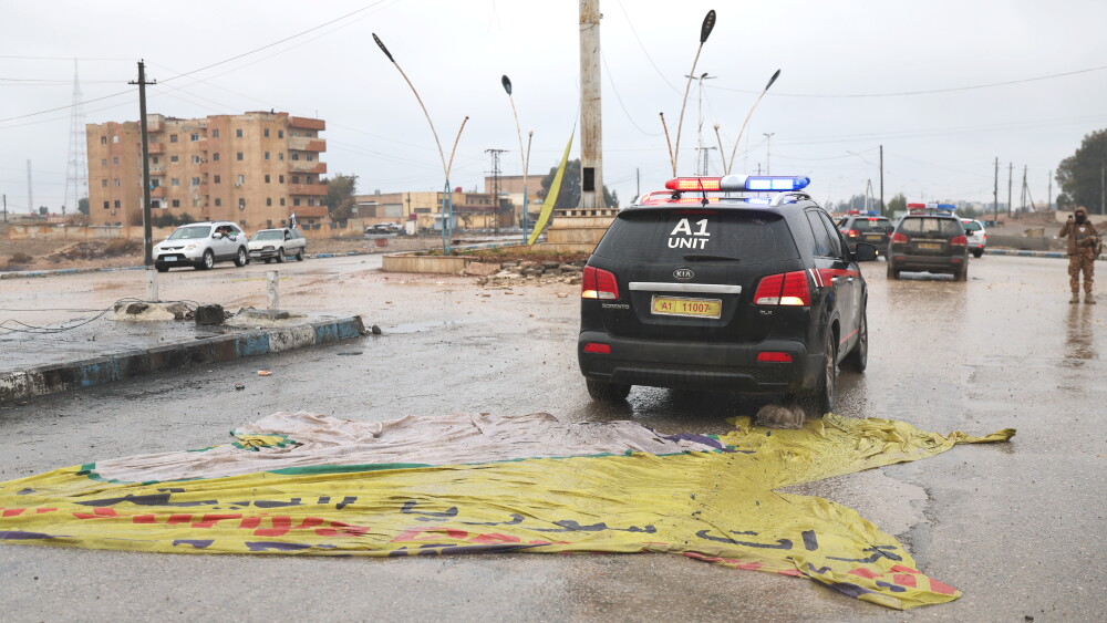 Flags of the Kurdish-led Syrian Democratic Forces (SDF) are driven over after the SDS’s withdrawal from Raqqa following the ceasefire with the Syrian Army in northeastern Syria; January 18, 2026.