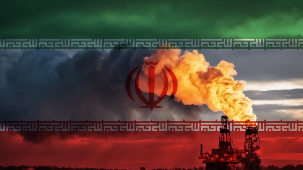 A natural gas drilling rig with the flag of Iran in the background.