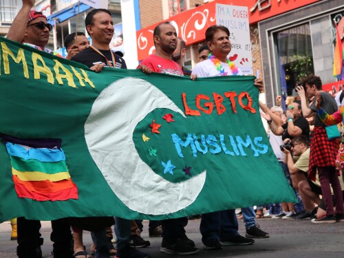 People march in support of LGBTQ+ Muslims in a gay pride parade in London.