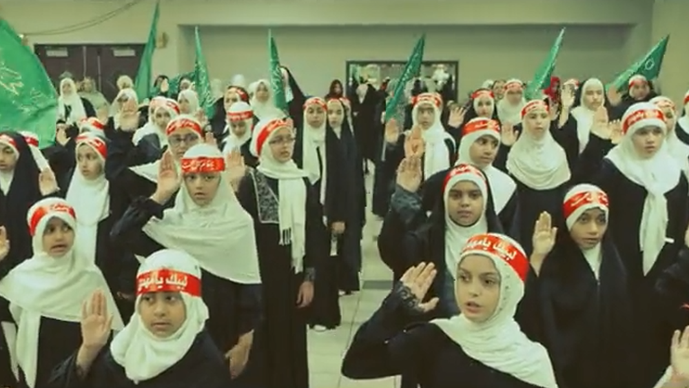 Children at the Islamic Education Center in Houston, which has received almost half a million dollars from the Texas state government, perform a song pledging allegiance to Iran's Supreme Leader