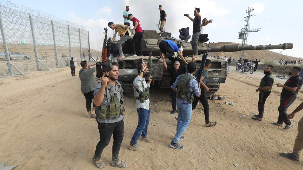 Palestinians storm Israeli territory, east of the city of Khan Yunis, on October 7, 2023.