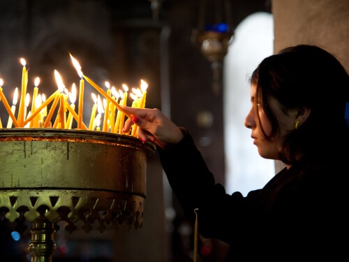 Israel’s global standing depends on its relations with the Christian world. The vast majority of the Zionists in the world are Christian. A girl lights a prayer candle in the Church of the Nativity, traditional site of the birth of Jesus, Bethlehem, West Bank.