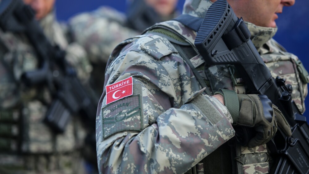 Turkish soldiers carry MPT 76 assault rifles.