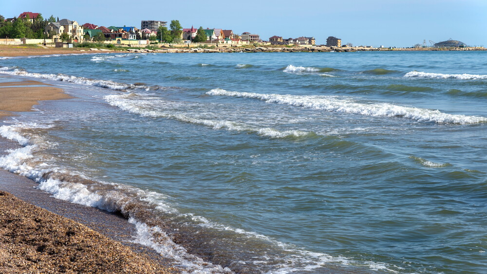 Waves of the Caspian Sea on the beach of Derbent, Republic of Dagestan, Russia.
