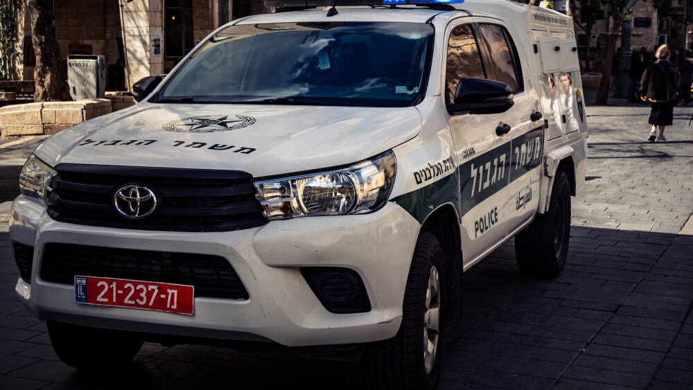 Israel’s Arab communities cannot hand their security entirely to the state. Extended family clans often act as parallel authorities, enforcing silence that shields killers and frightens witnesses. Israeli police patrol vehicles moving through the city. Image: Israeli law enforcement and security operations in the streets of the capital; Jerusalem, Feb. 21, 2026.