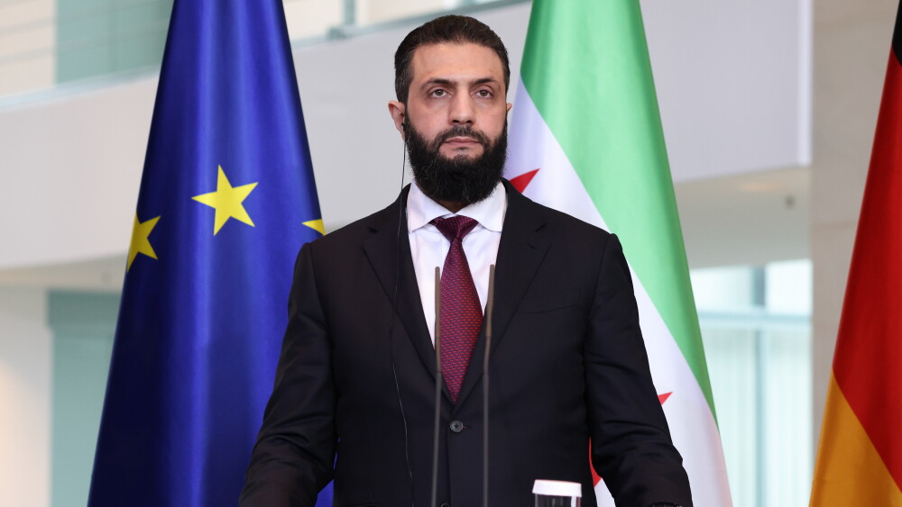 Al-Sharaa is a veteran of the global jihadist movement who gained operational experience fighting American forces alongside al-Qaeda in Iraq after the 2003 invasion. Following his subsequent incarceration at Camp Bucca, he spearheaded the creation of Jabhat al-Nusra, which operated as al-Qaeda’s official Syrian franchise. Image: Al-Sharaa in Berlin, March 30, 2026.