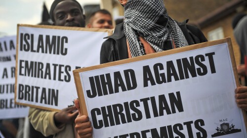 The writer Renaud Camus, 78, author of Le Grand Remplacement (The Great Replacement) was informed by British officials that his “presence in the U.K.” is “not considered to be beneficial to the public good." Above, a July 30, 2011, march in London by Islamic extremists.
