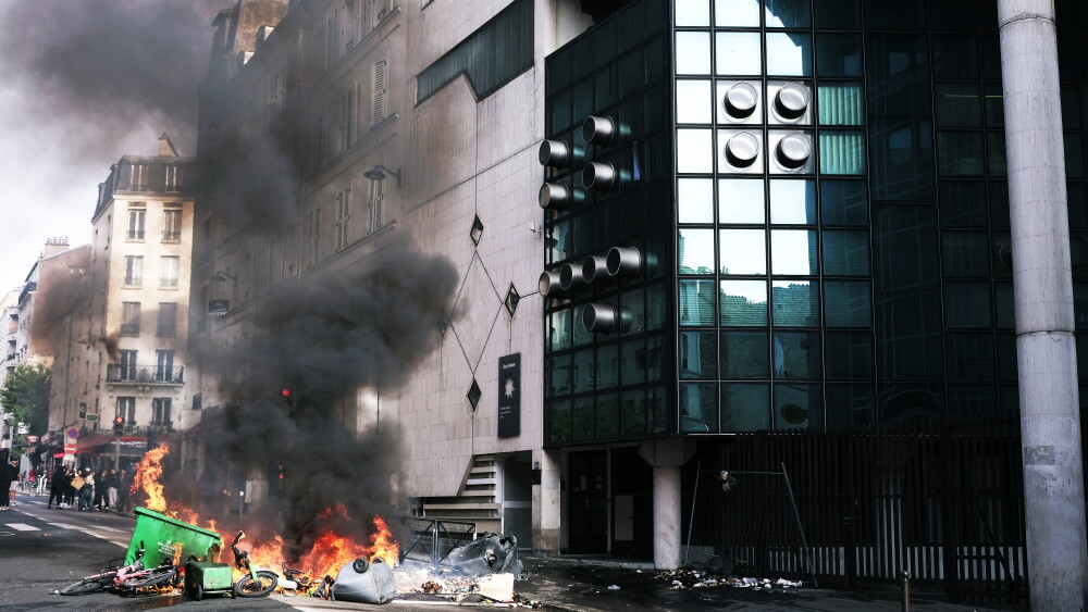 We wanted a society without violence. We have ended up with a society without defenses. Urban riots outside a high school where students are setting fires; Paris, September 2026.