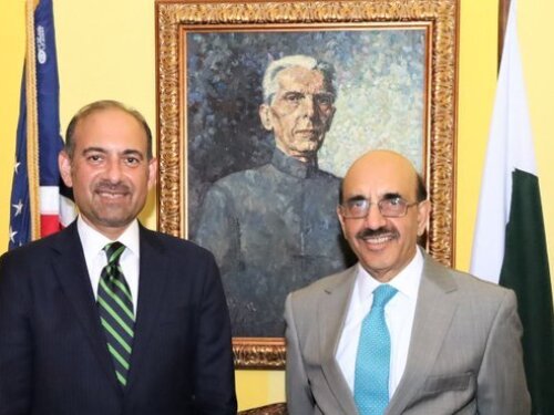 Dilawar Syed, left, poses for a photograph with Pakistani Ambassador to the U.S. Masood Khan, who "very clearly supports terrorist," in the words of three U.S. Congress members. The pair would meet at least four times in nine months while Syed served at the State Department’s Bureau of Economic and Business Affairs.