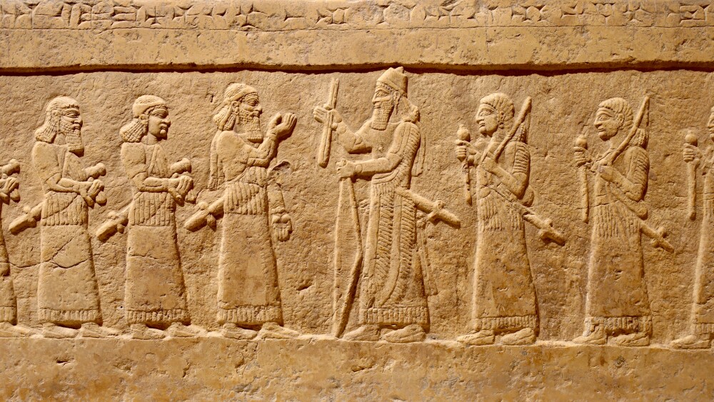 A wall relief features Assyrian King Shalmaneser III (reigned 859–824 BCE).