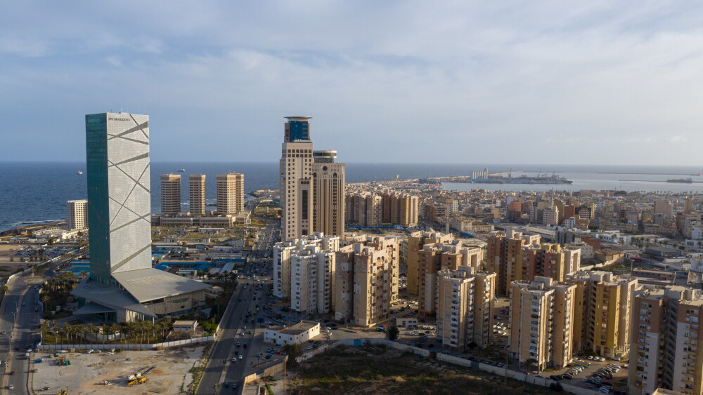 On August 30, 2026, political delegates in Tripoli signed a final framework agreement sponsored by the United Nations Support Mission in Libya. However, less than 24 hours after the signing ceremony, serious executive infighting exposed how procedural maneuvering among political elites continues to imperil Libya’s path toward stability. Seafront view of Tripoli, Libya, February 11, 2021.