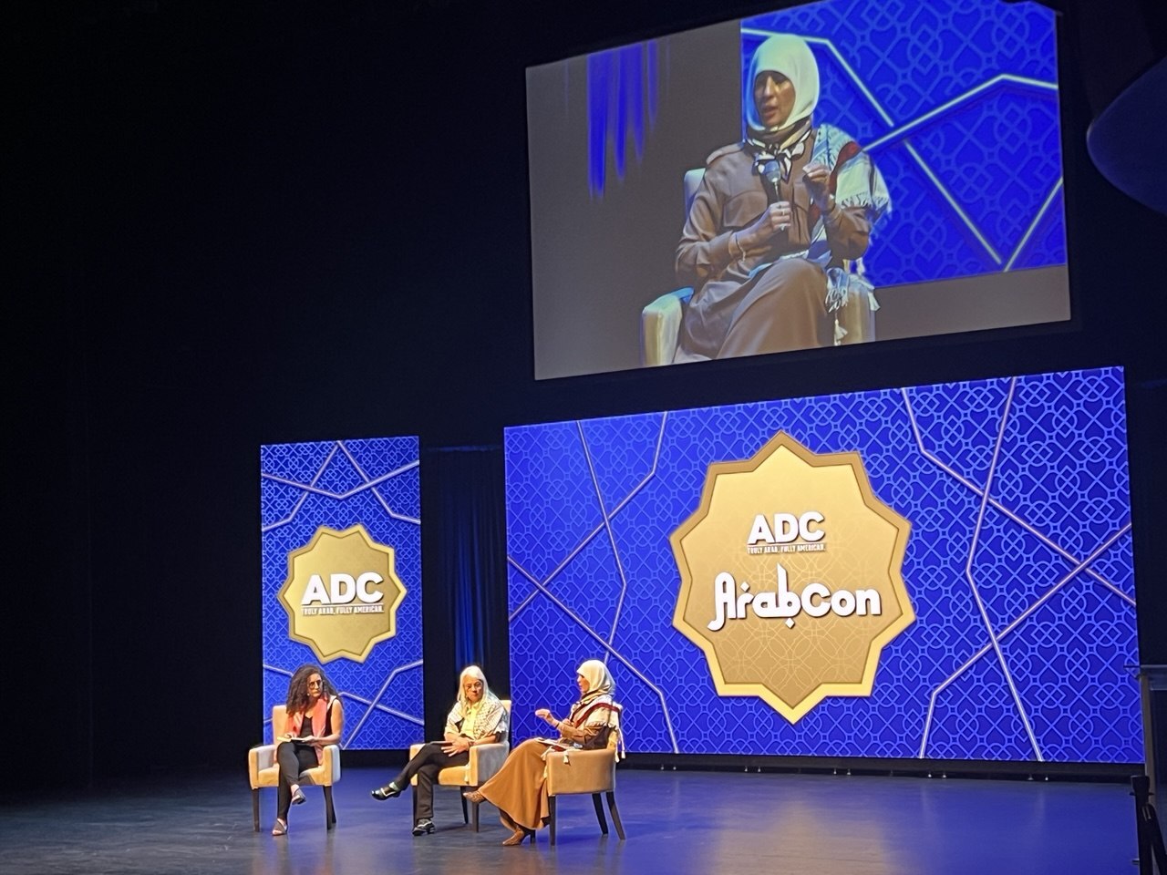 Lara Sheehi, professor at the Doha Institute (left), and Karen Suyemoto, professor at UMass Boston (center), participate in a panel discussion moderated by Sawssan Ahmed, professor at California State University (right). Ahmed performed the obligatory land acknowledgment prior to the discussion.