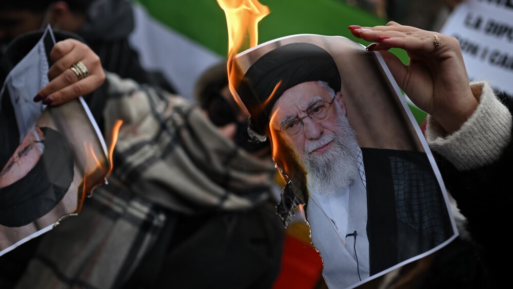 As protests spread to European cities, demonstrators in Milan, Italy, burned photos of Supreme Leader Ali Khamenei.