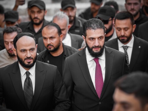Syrian President Ahmed al-Sharaa (center right) in May 2025.