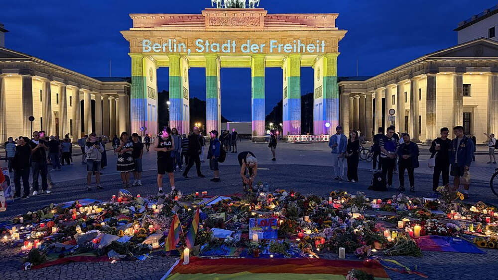 Activists organized a vigil at Brandenburg Gate the day after a terrorist attack on the Berlin Pride event on July 25, 2026.