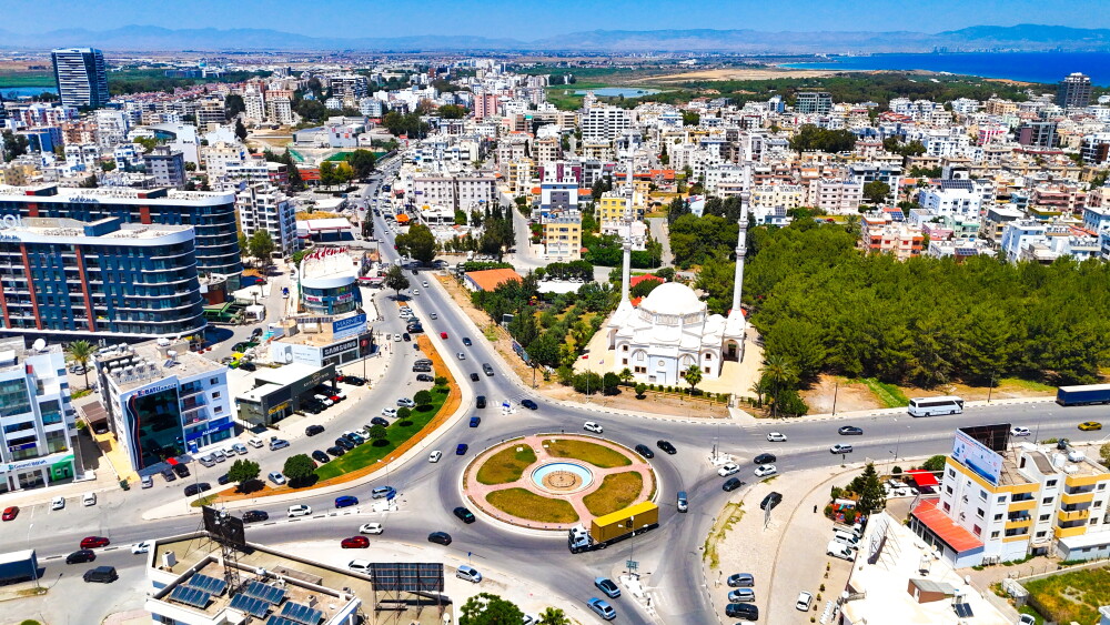 As the Eastern Mediterranean becomes more popular, many Europeans, Turks, and Israelis flock to Turkish-occupied northern Cyprus in search of a bargain. Image: Aerial view of the city center of Famagusta in Turkish-occupied northern Cyprus; May 21, 2025.