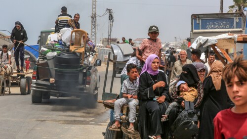 Palestinians migrate to the city of Deir Balah from Rafah in the Gaza Strip in May 2024.
