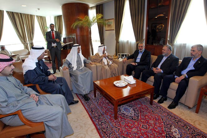 The IICO, for which Mohamed Ashmawey later worked, hosted the late Hamas terrorist leaders Ismail Haniyeh (third from right) and Yahya Sinar (far-right)