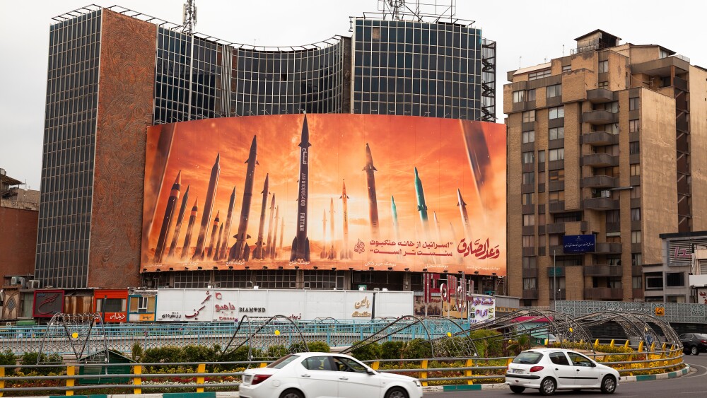 A billboard in Tehran, Iran, in May 2024 shows ballistic missiles fired at Israel.
