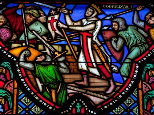 A stained glass window depicting the First Crusade with Godfrey of Bouillon; the Cathedral of St. Michael and St. Gudula, Brussels, Belgium.